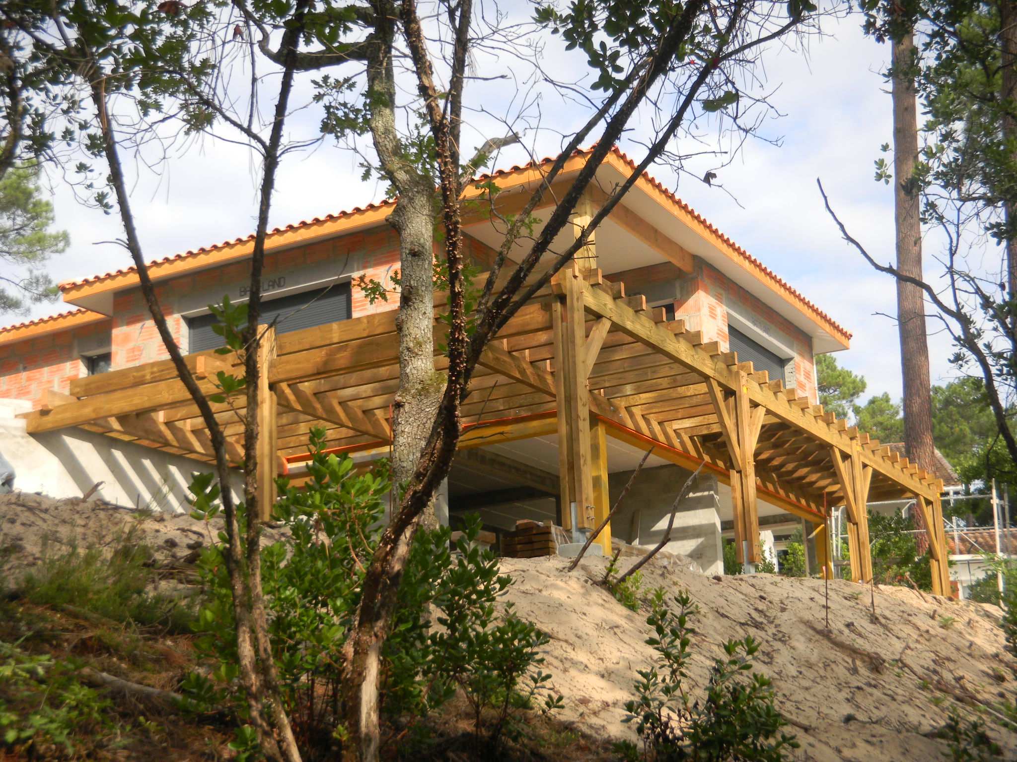 terrasse pilotis contre plongée construction